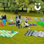 Giant Draughts at an out door corpoarte fun day for young adults
