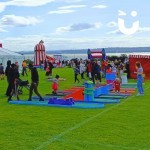 A photo of a family fun day being enjoyed on a clear day