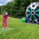 Inflatable Golf Darts Hire being enjoyed by Mike Tindall at a celebrity event