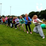 children playing on the tug of war