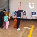 Soft Target Archery Hire Set up indoors at a warehouse family fun day with a father and daughter taking aim
