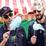 Candy Floss cart being used by band members of All Time Low