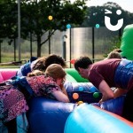 Hungry Hippos Inflatable Hire close up with 4 happy competitors