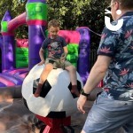 Rodeo Football Inflatable At An Outdoor Family Fun Day