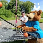 Fun Bear Hire playing basketball at a family fun day in the sunshine